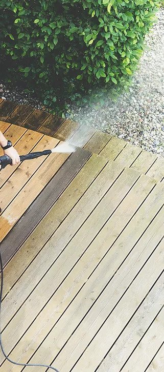 Image of a deck being powerwashed